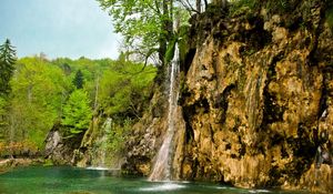 Preview wallpaper waterfall, river, currents, grass, stones, trees