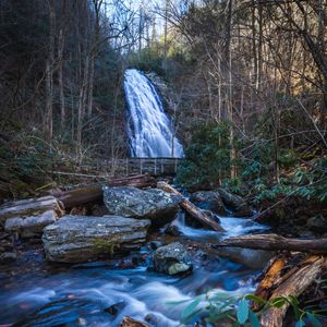 Preview wallpaper waterfall, river, stones, logs, trees