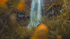 Preview wallpaper waterfall, rock, cliff, grass, flowers, nature