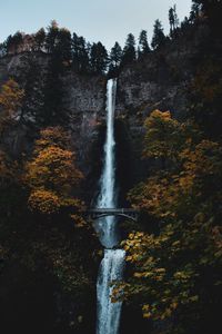 Preview wallpaper waterfall, rock, cliff, trees, bridge