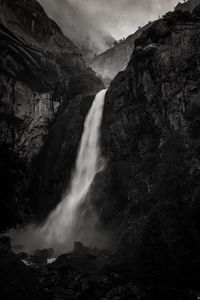Preview wallpaper waterfall, rock, cliff, black and white, landscape