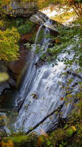 Preview wallpaper waterfall, rock, landscape, nature, leaves