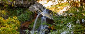 Preview wallpaper waterfall, rock, landscape, nature, leaves