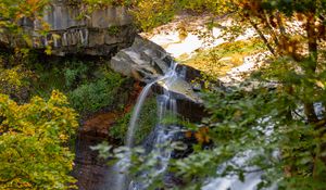 Preview wallpaper waterfall, rock, landscape, nature, leaves