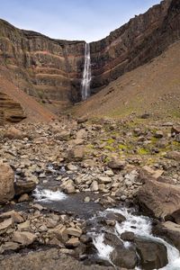 Preview wallpaper waterfall, rock, slope, stones, stream, nature