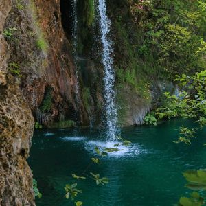 Preview wallpaper waterfall, rock, spray, water, plants