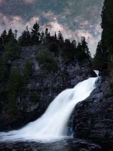 Preview wallpaper waterfall, rock, trees, starry sky, night, landscape