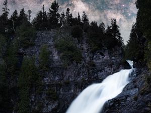 Preview wallpaper waterfall, rock, trees, starry sky, night, landscape