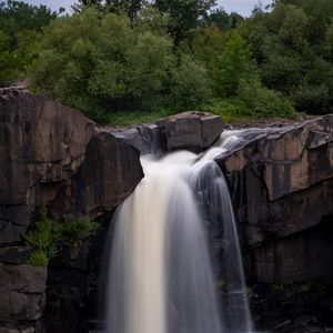 Preview wallpaper waterfall, rock, water, bushes, landscape