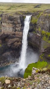 Preview wallpaper waterfall, rocks, cliff, grass, stones