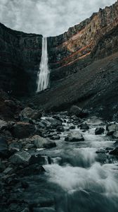 Preview wallpaper waterfall, rocks, cliff, stream, stones