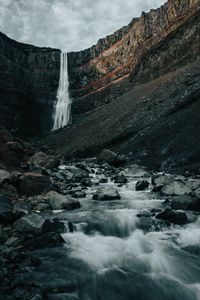 Preview wallpaper waterfall, rocks, cliff, stream, stones