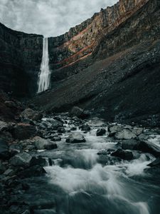 Preview wallpaper waterfall, rocks, cliff, stream, stones