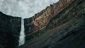 Preview wallpaper waterfall, rocks, cliff, stream, stones