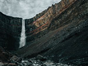 Preview wallpaper waterfall, rocks, cliff, stream, stones