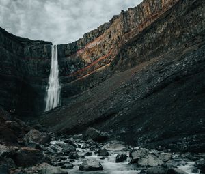 Preview wallpaper waterfall, rocks, cliff, stream, stones