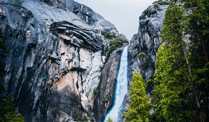 Preview wallpaper waterfall, rocks, cliff, stones, river, trees