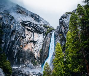 Preview wallpaper waterfall, rocks, cliff, stones, river, trees