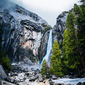 Preview wallpaper waterfall, rocks, cliff, stones, river, trees