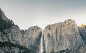 Preview wallpaper waterfall, rocks, grass, cliff