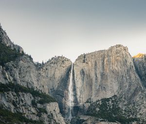 Preview wallpaper waterfall, rocks, grass, cliff