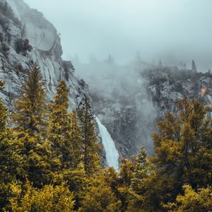 Preview wallpaper waterfall, rocks, mountains, trees, landscape, fog