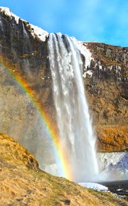 Preview wallpaper waterfall, rocks, rainbow, snow