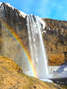 Preview wallpaper waterfall, rocks, rainbow, snow