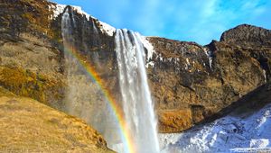 Preview wallpaper waterfall, rocks, rainbow, snow