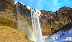 Preview wallpaper waterfall, rocks, rainbow, snow