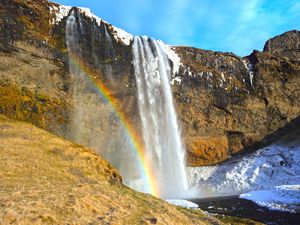 Preview wallpaper waterfall, rocks, rainbow, snow