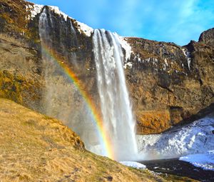 Preview wallpaper waterfall, rocks, rainbow, snow