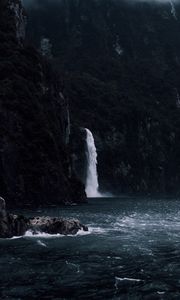 Preview wallpaper waterfall, rocks, sea, cliff, stones