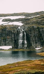 Preview wallpaper waterfall, rocks, sea, cliff, stones, water