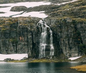 Preview wallpaper waterfall, rocks, sea, cliff, stones, water