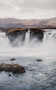 Preview wallpaper waterfall, rocks, stones, mountains, landscape