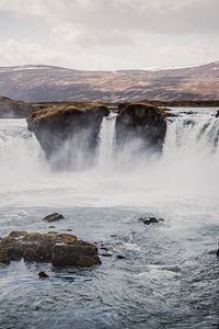Preview wallpaper waterfall, rocks, stones, mountains, landscape