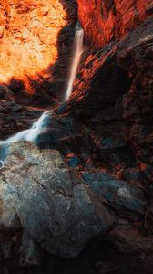 Preview wallpaper waterfall, rocks, stones, stream, light