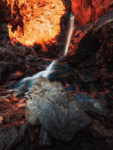 Preview wallpaper waterfall, rocks, stones, stream, light