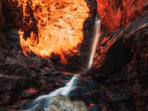 Preview wallpaper waterfall, rocks, stones, stream, light