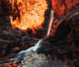 Preview wallpaper waterfall, rocks, stones, stream, light