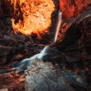 Preview wallpaper waterfall, rocks, stones, stream, light