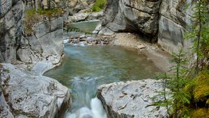 Preview wallpaper waterfall, rocks, stones, grass, moss