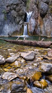 Preview wallpaper waterfall, rocks, stones, log, water