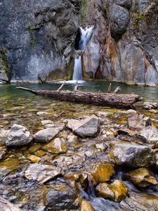 Preview wallpaper waterfall, rocks, stones, log, water