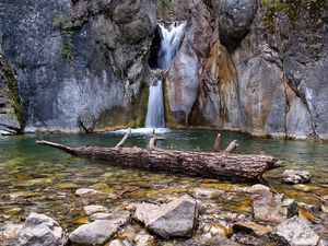 Preview wallpaper waterfall, rocks, stones, log, water