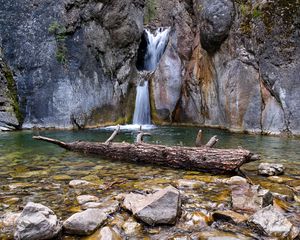 Preview wallpaper waterfall, rocks, stones, log, water