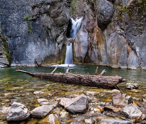 Preview wallpaper waterfall, rocks, stones, log, water