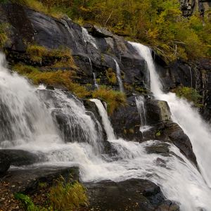 Preview wallpaper waterfall, rocks, stones, stream, grass