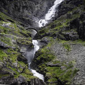 Preview wallpaper waterfall, rocks, stones, bridge, water, nature
